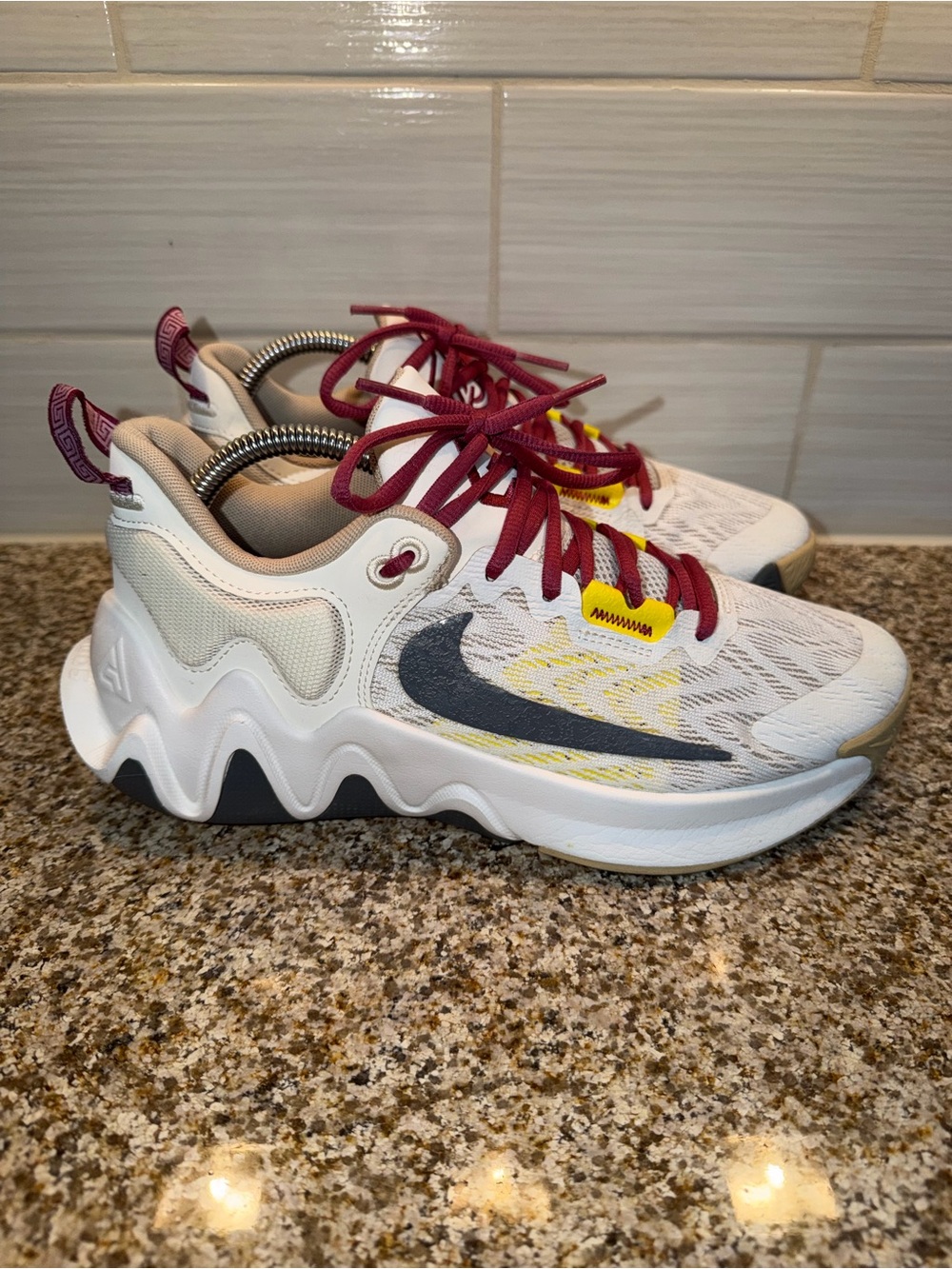 Nike Men’s White Sneakers with Maroon Laces and Black Swoosh